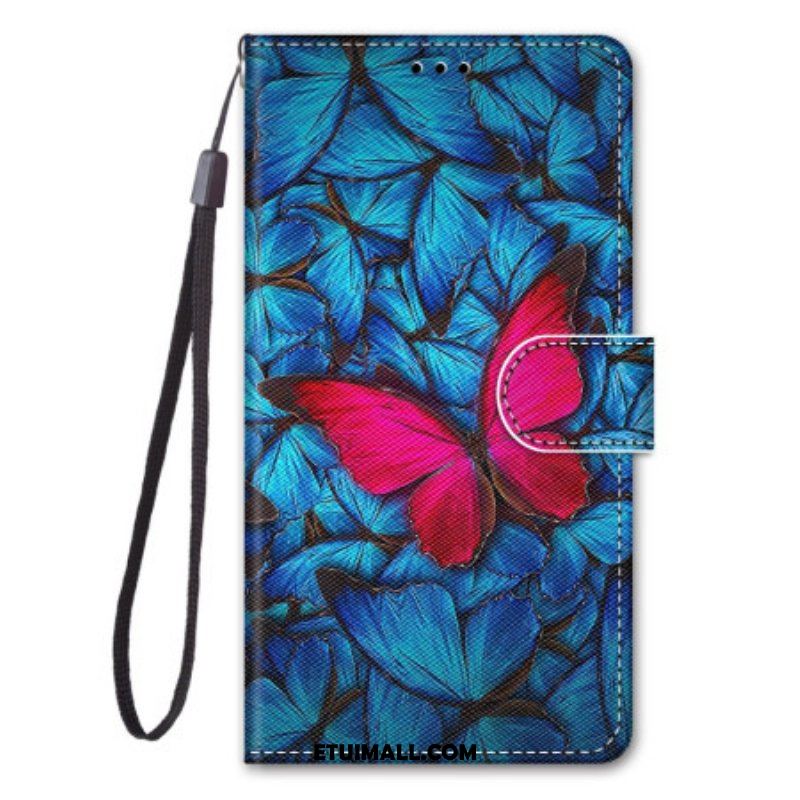 Etui Folio do Sony Xperia 1 IV Czerwony Motyl Niebieskim Tle